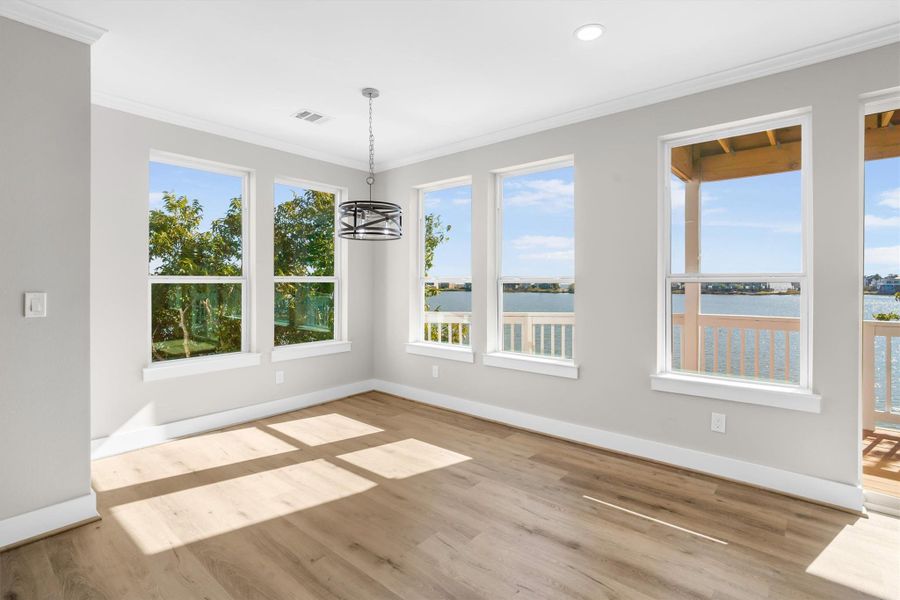 Dining/breakfast area surrounded by waterfront views Dining/breakfast area surrounded by waterfront views