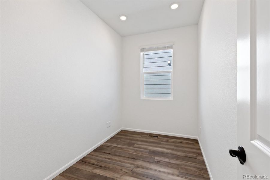 Spacious, unfurnished interior of a new home in Woodrose at Painted Prairie, Aurora (Image 22).