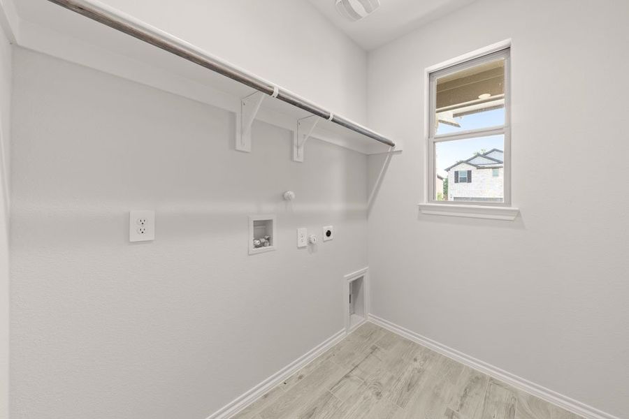 Representative exterior photo of a completed home built from the Willow by Impression Homes in ValleyBrooke, Mesquite, TX (Image 25).