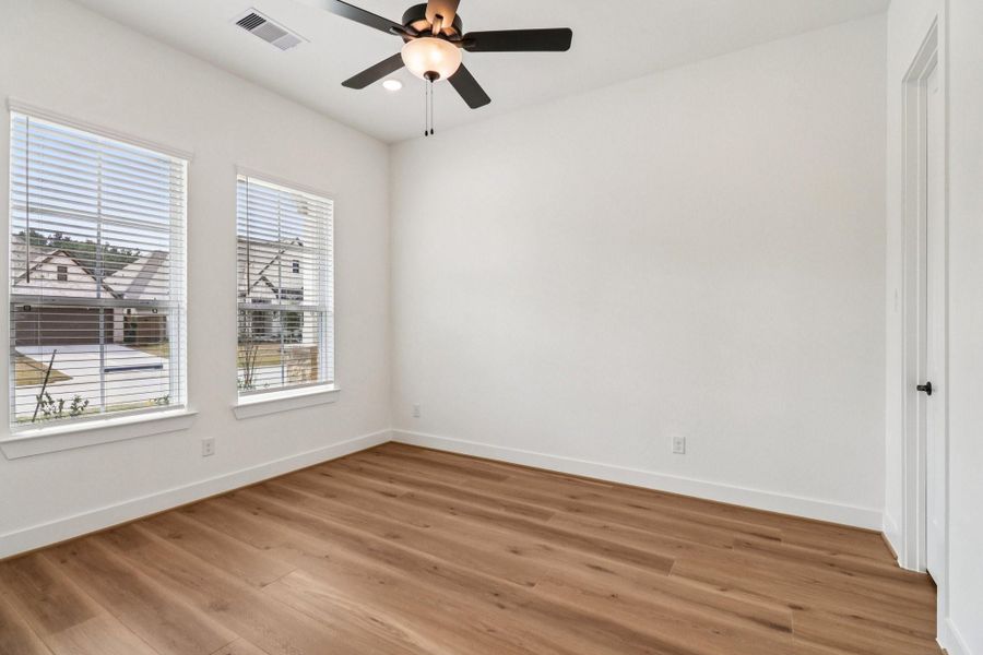 Spacious, unfurnished interior of a new home in The Highlands, Porter (Image 29).