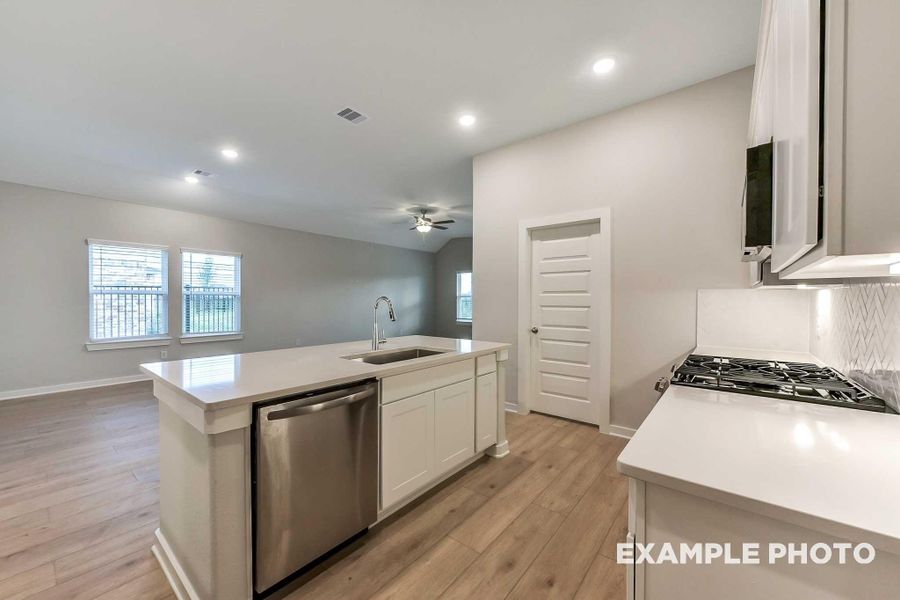 Furnished interior view inside a new home in Sunterra, Katy (Image 3).