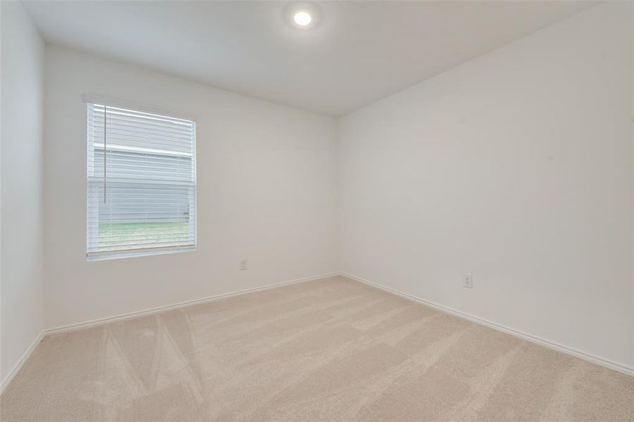 Unfurnished room with carpet flooring