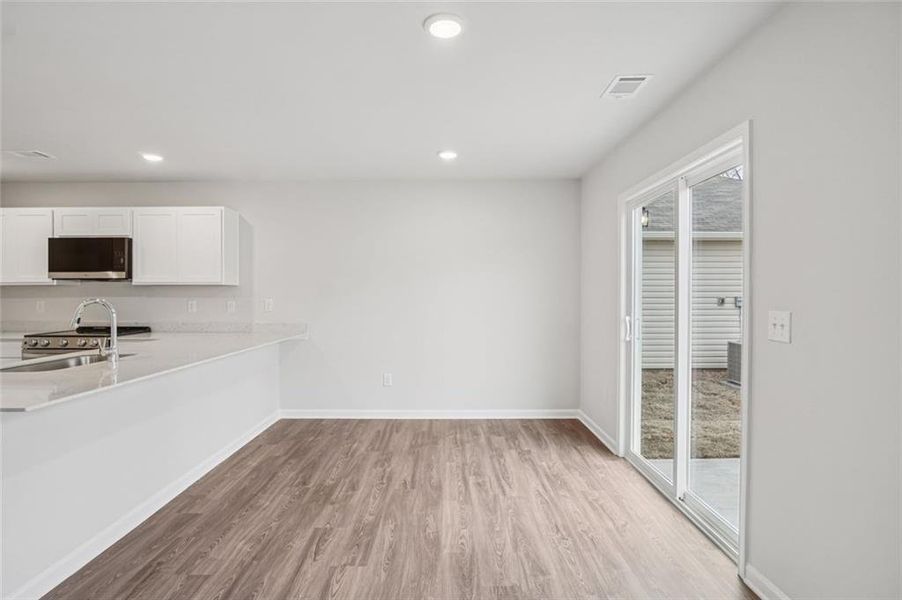 Spacious, unfurnished interior of a new home in Arrowhead By The Lake, Lizella (Image 12).