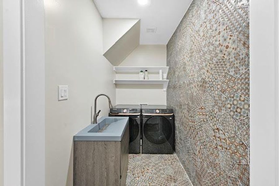 1 of 2 laundry rooms 1 of 2 laundry rooms