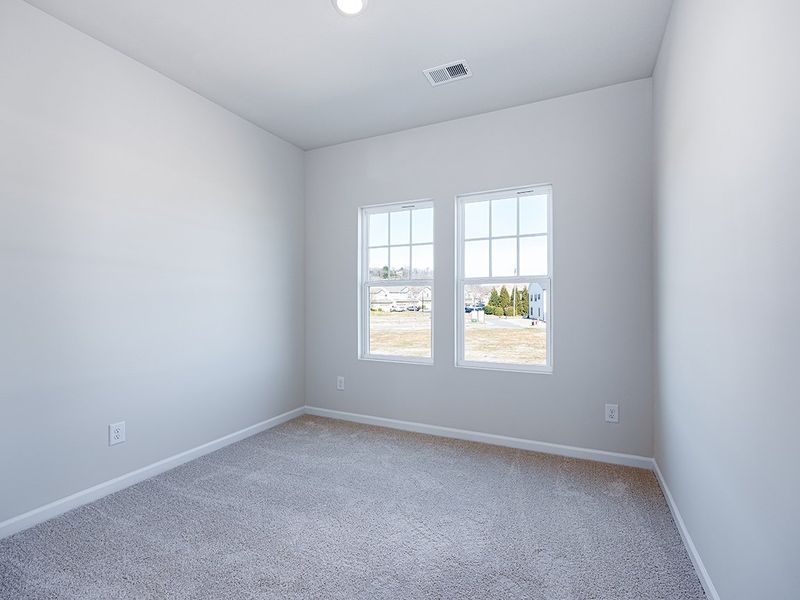 Representative unfurnished interior of a home built from the Watkins by Brookline Homes in The Crossing at Cramerton Mills, Gastonia (Image 16).