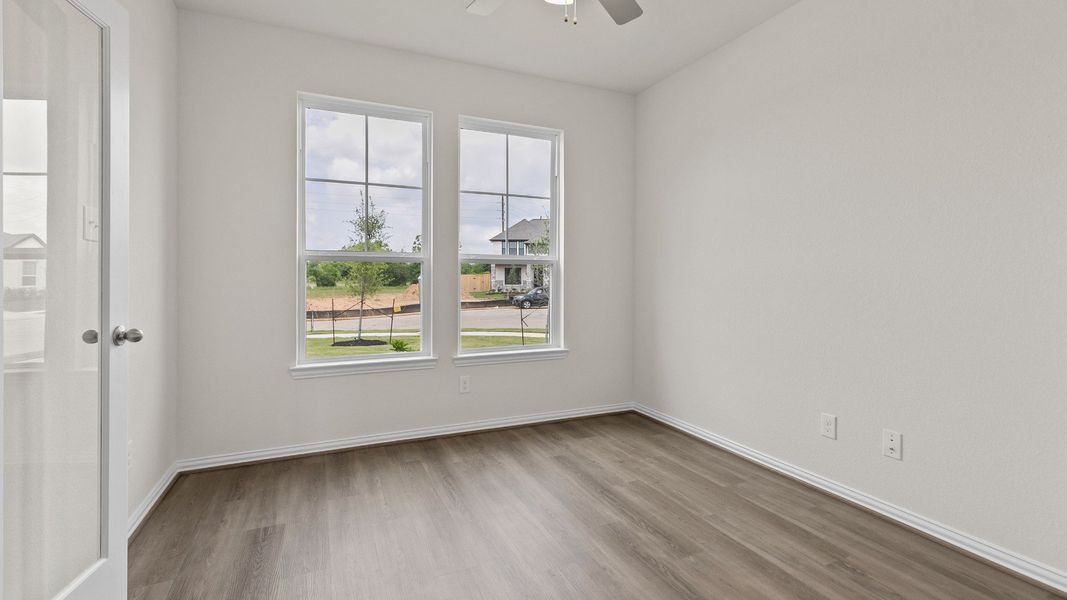 Representative furnished interior of a home built from the Southfork by Brightland Homes in Sunterra, Katy (Image 6).