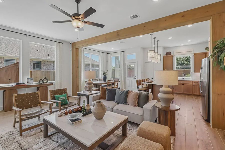 Furnished interior view inside a new home in Meridiana Chateau, Manvel (Image 12).
