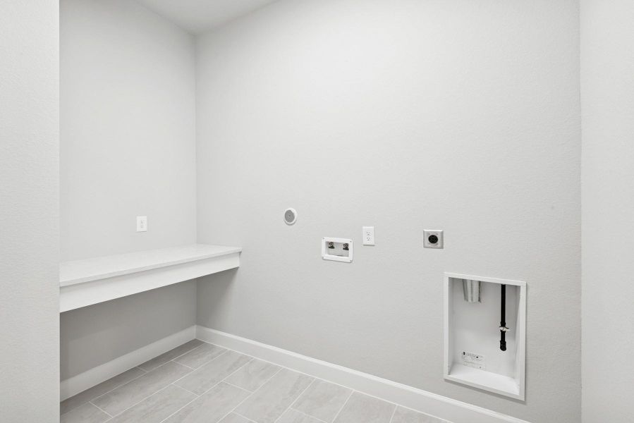 Spacious, unfurnished interior of a new home in Riceland 50’ Alley Load Homesites, Mont Belvieu (Image 20).