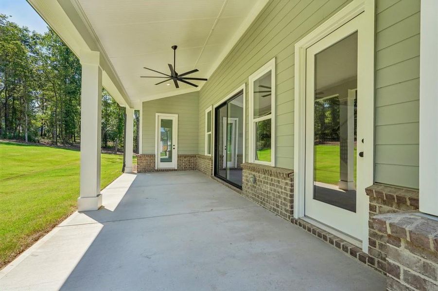 Exterior details and patio area of a home in Arden on Lanier, Cumming (Image 25).