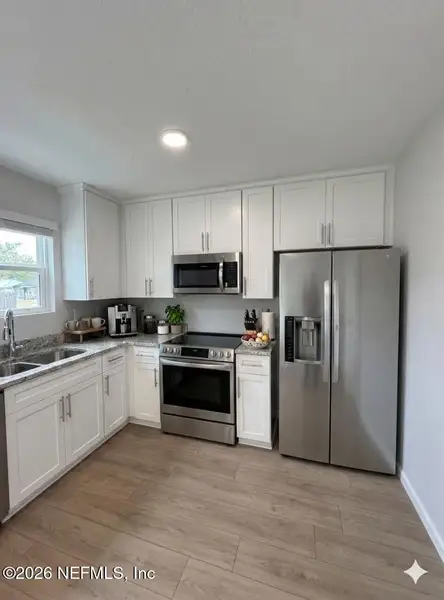 Furnished interior view inside a new home in , Jacksonville (Image 4).