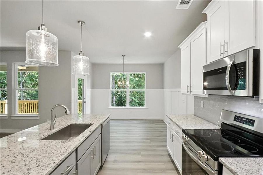 Furnished interior view inside a new home in Traditions of Braselton, Jefferson (Image 28).
