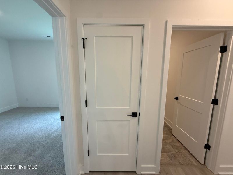 Spacious, unfurnished interior of a new home in Wood Creek Landing, Leland (Image 33). Spacious, unfurnished interior of a new home in Wood Creek Landing, Leland (Image 33).