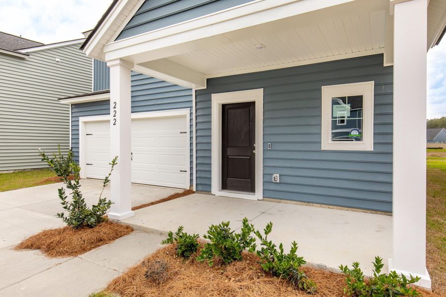 Exterior details and patio area of a home in Sweetgrass at Summers Corner, Summerville (Image 3). Exterior details and patio area of a home in Sweetgrass at Summers Corner, Summerville (Image 3).