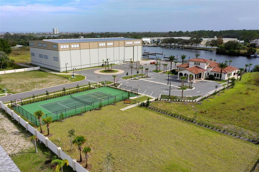 Front exterior of a new home in Marina Del Palma, Palm Coast, FL, highlighting curb appeal (Image 1).