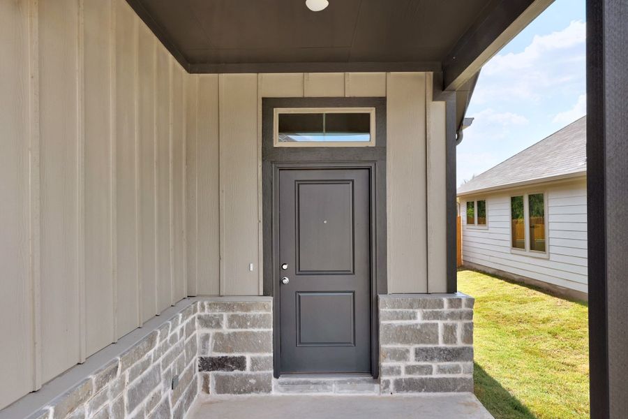 Exterior details and patio area of a home in Trinity Ranch, Elgin (Image 3).