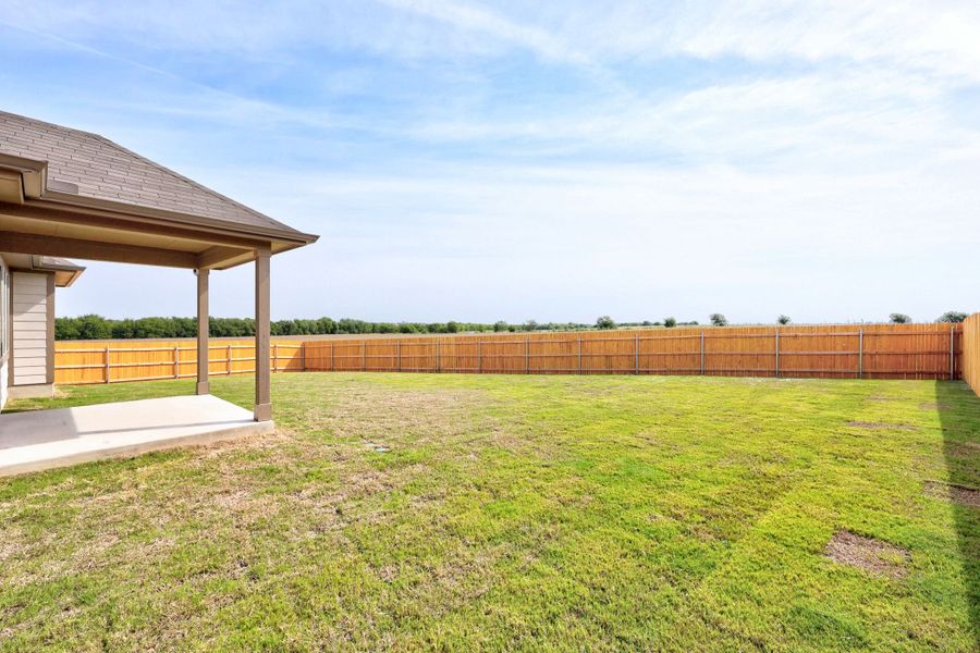 Exterior details and patio area of a home in Prairie Winds, Hutto (Image 4).