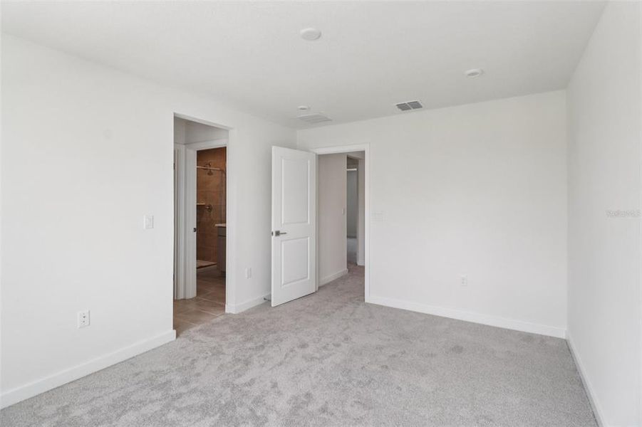 Spacious, unfurnished interior of a new home in Cyrene at Harmony, St. Cloud (Image 15).