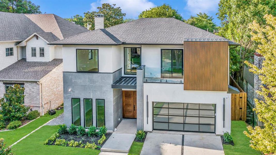 Front exterior of a new home in , Dallas, TX, highlighting curb appeal (Image 1). Front exterior of a new home in , Dallas, TX, highlighting curb appeal (Image 1).