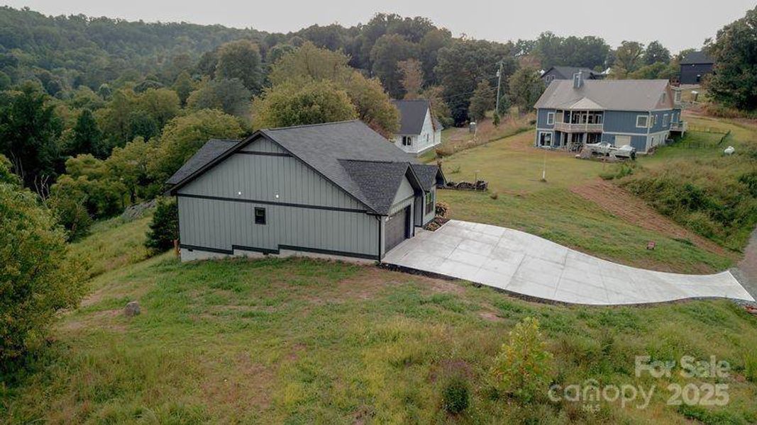 Front exterior of a new home in , Alexander, NC, highlighting curb appeal (Image 25). Front exterior of a new home in , Alexander, NC, highlighting curb appeal (Image 25).