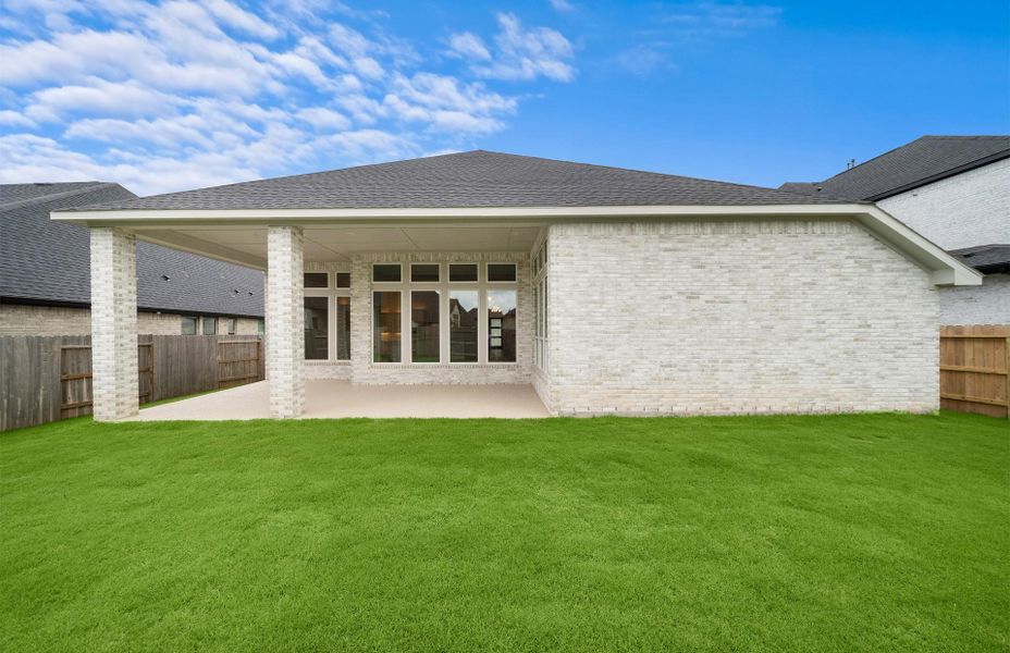 Exterior details and patio area of a home in Audubon 60', Magnolia (Image 3).