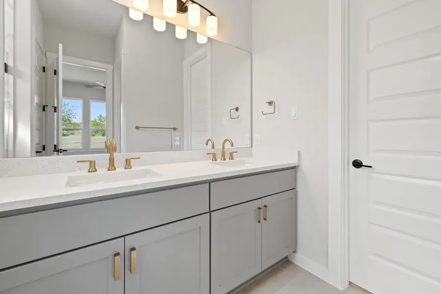 Furnished interior view inside a new home in Arbor Collection At Wolf Ranch, Georgetown (Image 11).