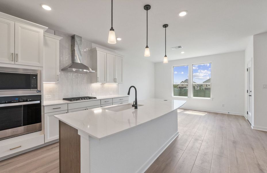 Furnished interior view inside a new home in Wolf Ranch, Georgetown (Image 13).