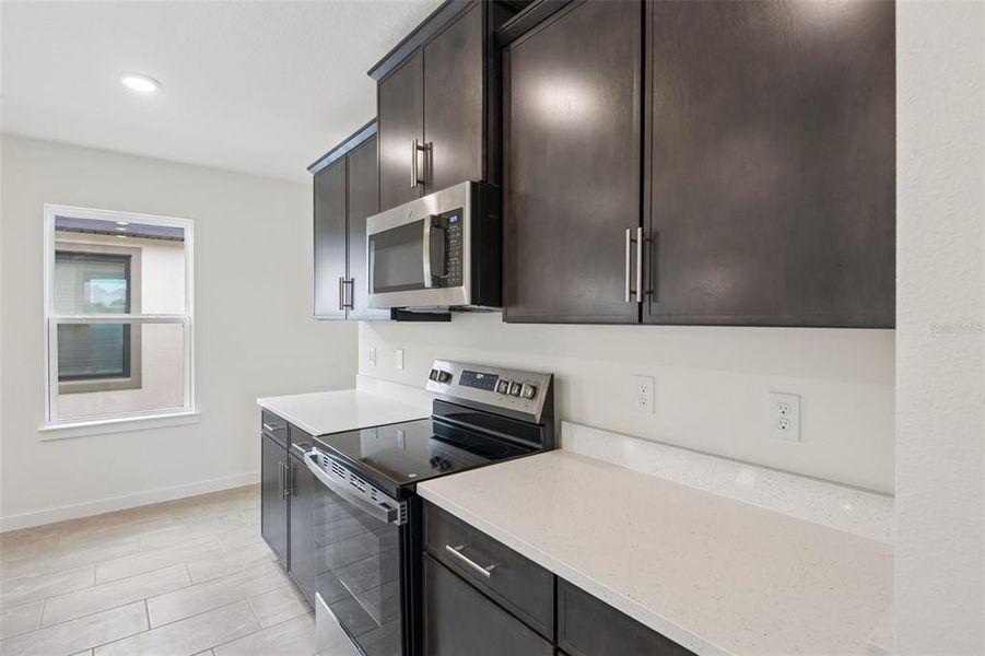 Furnished interior view inside a new home in Grasslands West, Lakeland (Image 10).