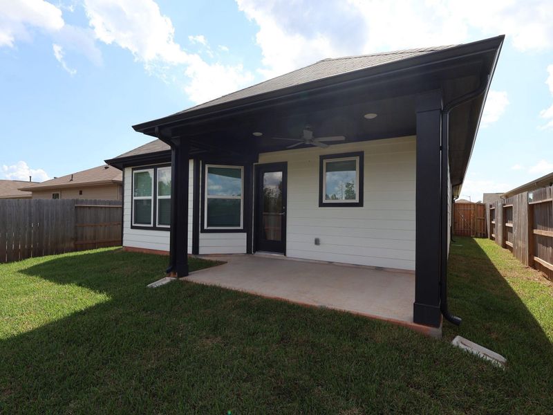 Exterior details and patio area of a home in Moran Ranch, Willis (Image 11). Exterior details and patio area of a home in Moran Ranch, Willis (Image 11).