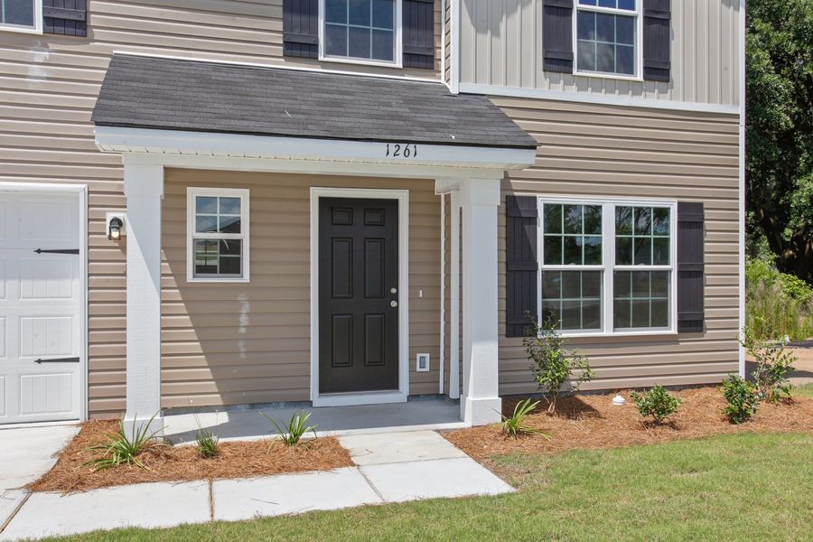 Representative exterior photo of a completed home built from the The Pamona by RTS Homes in Grand Reserve, Hinesville, GA (Image 17).