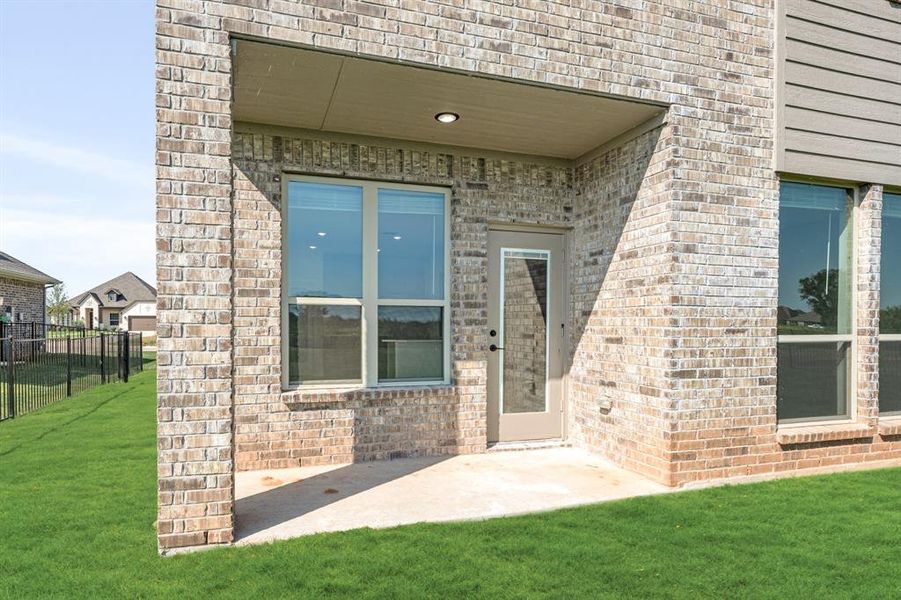 Front exterior of a new home in Abe's Landing, Granbury, TX, highlighting curb appeal (Image 23). Front exterior of a new home in Abe's Landing, Granbury, TX, highlighting curb appeal (Image 23).