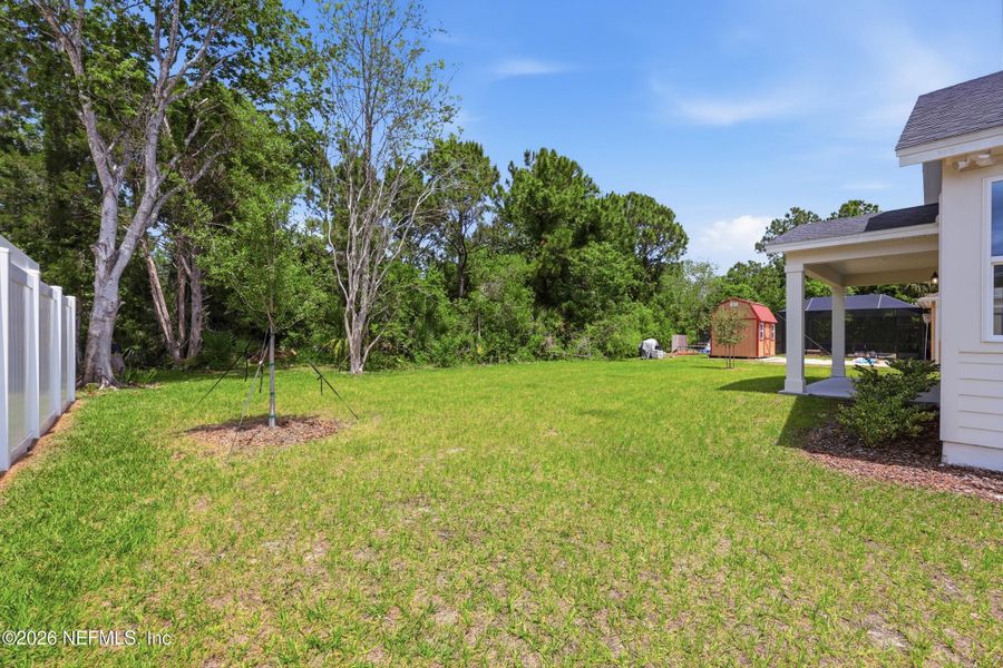 Exterior details and patio area of a home in Palm Coast Homes, Palm Coast (Image 32).