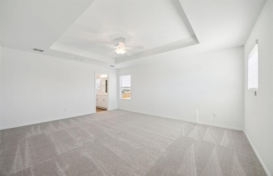 Spacious owner's suite highlighted by exquisite tray ceiling Spacious owner's suite highlighted by exquisite tray ceiling