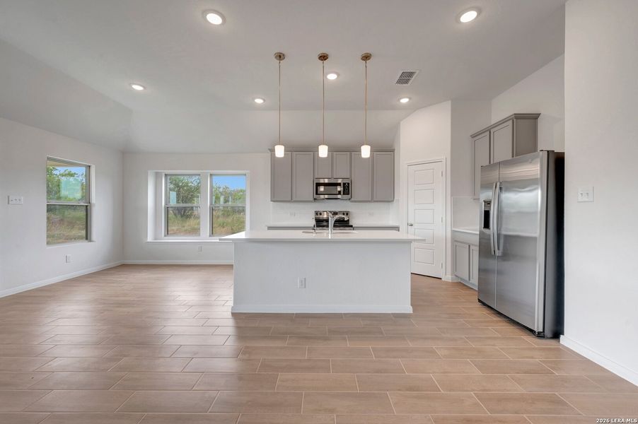 Furnished interior view inside a new home in Chaparral Ranch, Floresville (Image 13).