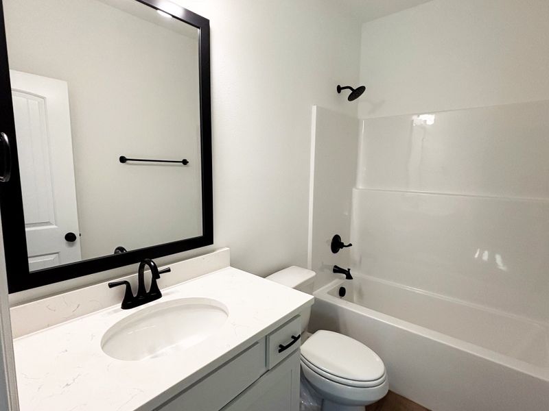 Furnished interior view inside a new home in Young Oaks, Crestview (Image 7).