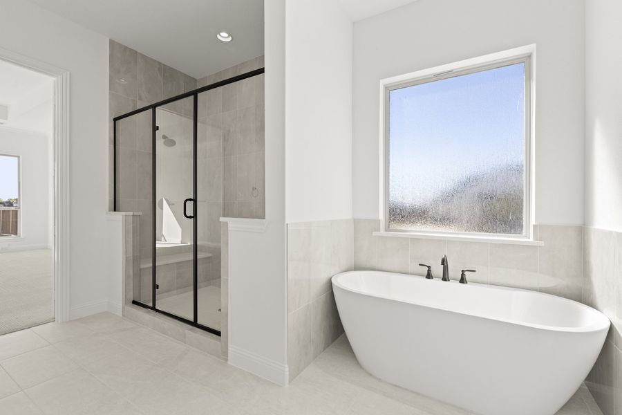 Representative furnished interior of a home built from the Hadley by Windsor Homes in Winding Creek, Rockwall (Image 15).