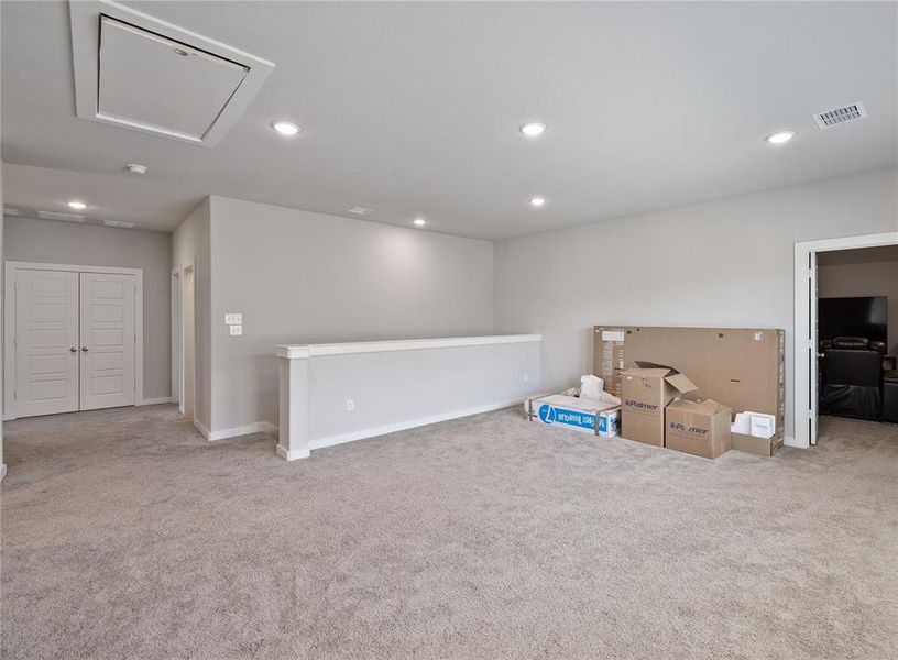 Unfurnished room featuring carpet