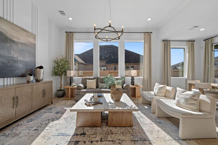 Representative furnished interior of a home built from the Bonneville by Chesmar Homes in University Heights, Round Rock (Image 9).