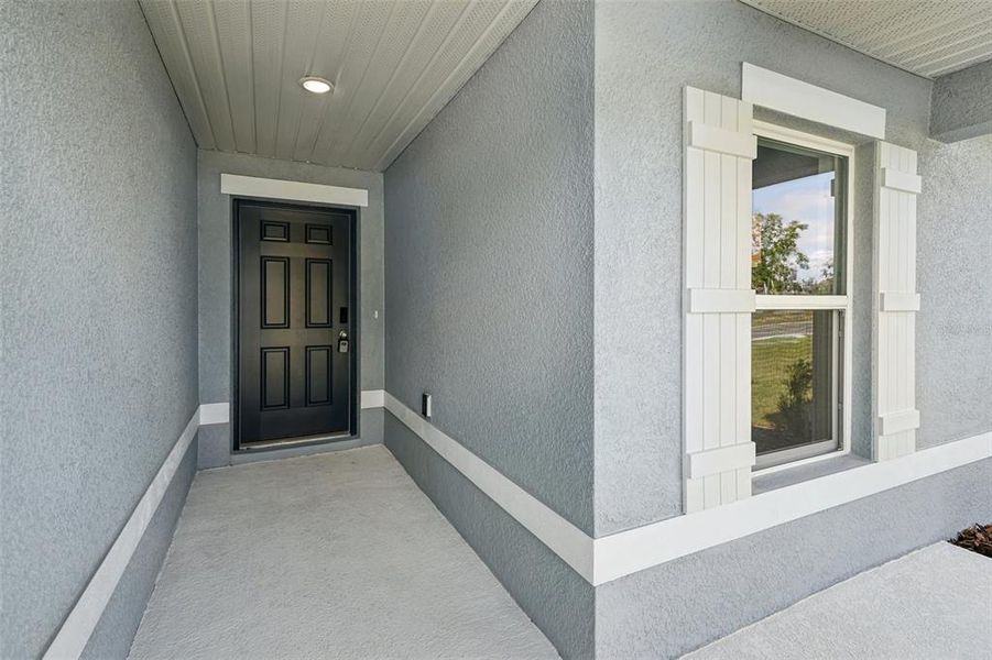Exterior details and patio area of a home in Sable Run, Ocala (Image 18).