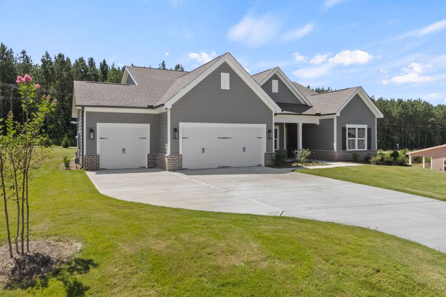 Front exterior of a new home in Cherokee Knoll, Williamston, SC, highlighting curb appeal (Image 2). Front exterior of a new home in Cherokee Knoll, Williamston, SC, highlighting curb appeal (Image 2).