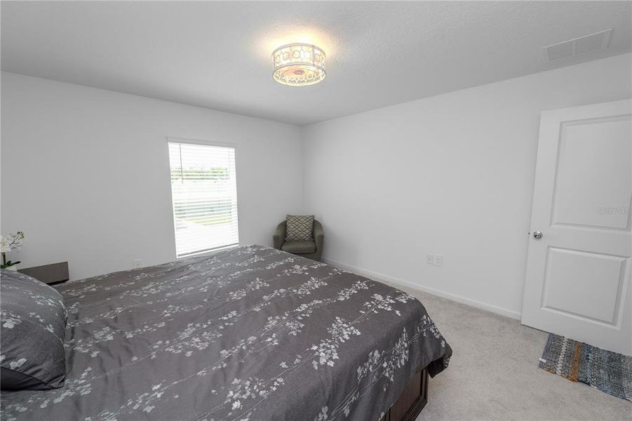 Furnished interior view inside a new home in Hunt Club Groves, Lake Wales (Image 10).