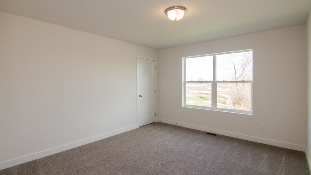 Representative unfurnished interior of a home built from the The Hartland by Norfolk Homes in Coronado Estates, Jackson (Image 74).