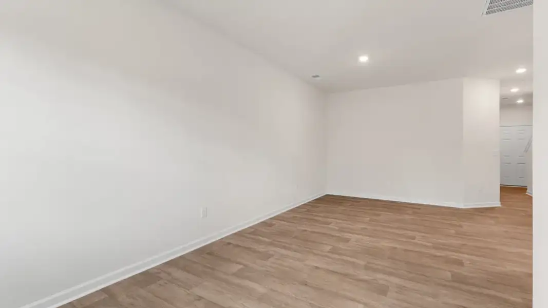 Spacious, unfurnished interior of a new home in The Townes at Galvins Ridge, Sanford (Image 17).