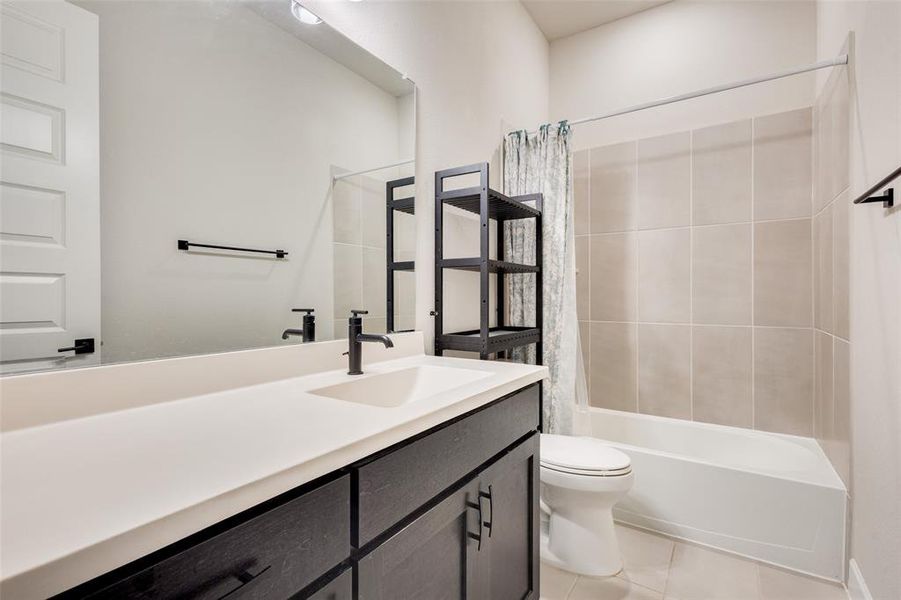 Bathroom located between two front rooms Bathroom located between two front rooms