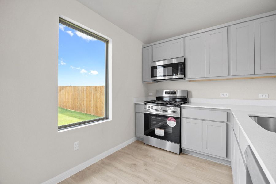 Furnished interior view inside a new home in Trinity Ranch, Elgin (Image 9).