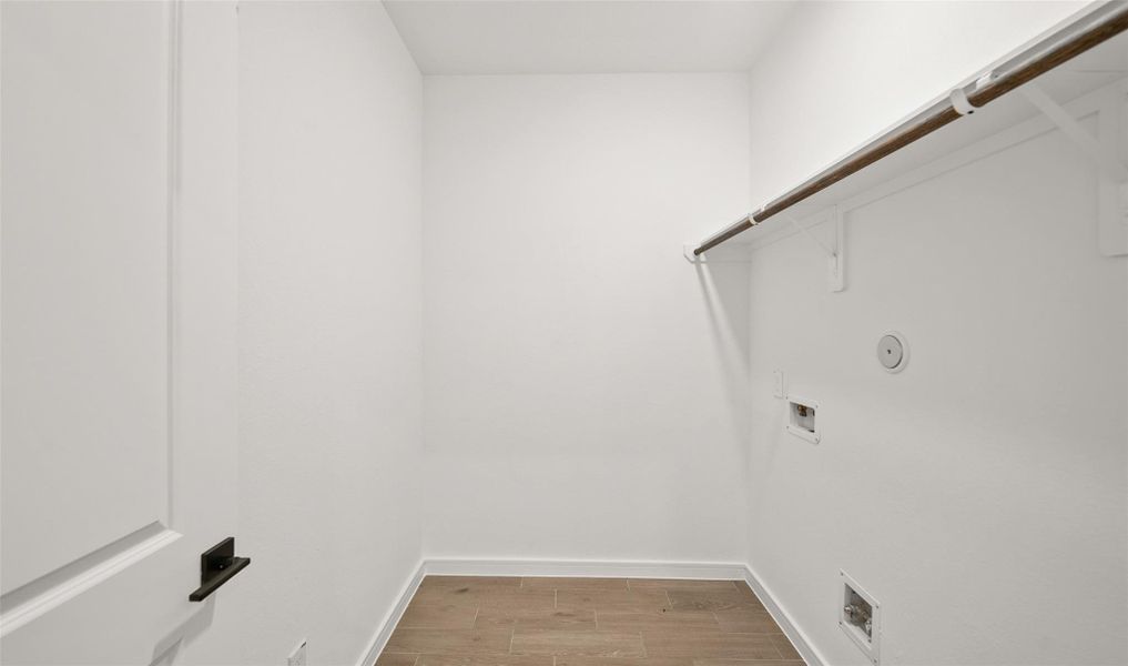 Laundry room (*Photo not of actual home and used for illustration purposes only.)