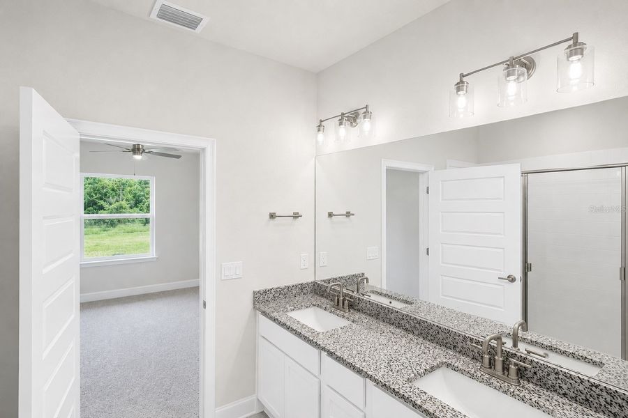 Furnished interior view inside a new home in Harmony Central, St. Cloud (Image 10).