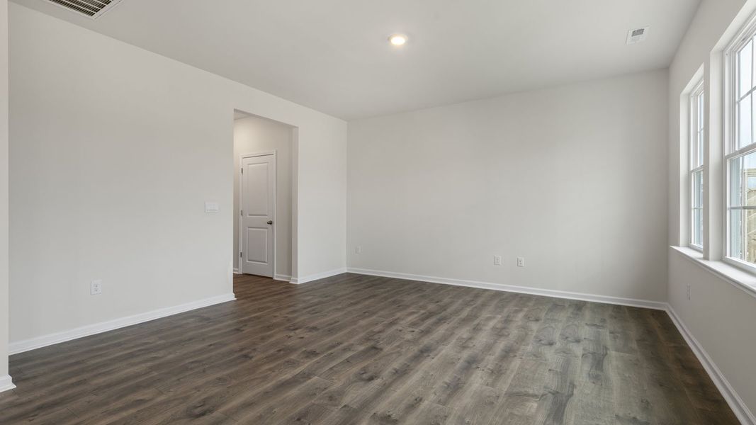 Spacious, unfurnished interior of a new home in The Grove at Matthews Landing, Fuquay Varina (Image 16).