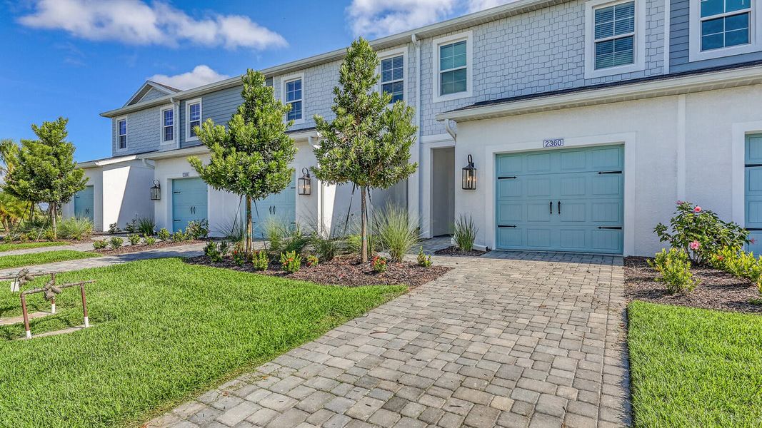 Exterior details and patio area of a home in Palm Grove Real Estate and Homes for Sale in Lakewood Ranch, FL - Neal Communities, Lakewood Ranch (Image 3).