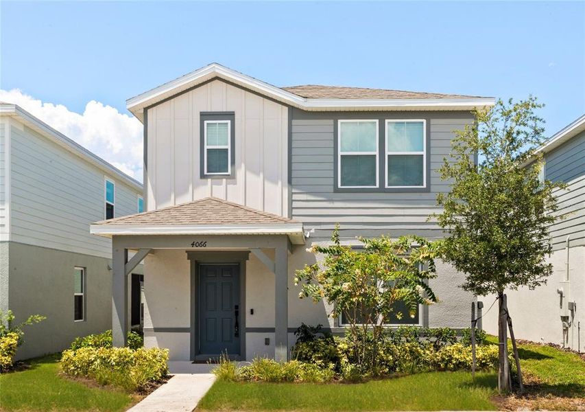 Front exterior of a new home in , Apopka, FL, highlighting curb appeal (Image 12).