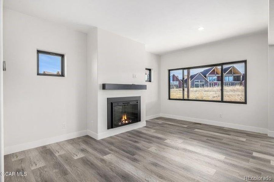 Spacious, unfurnished interior of a new home in , Granby (Image 38).